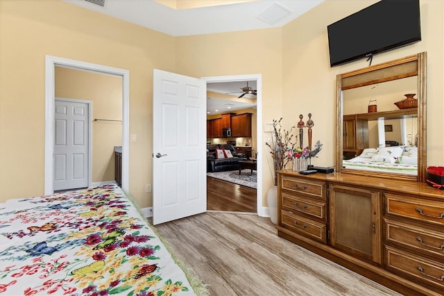 bedroom with light wood-type flooring