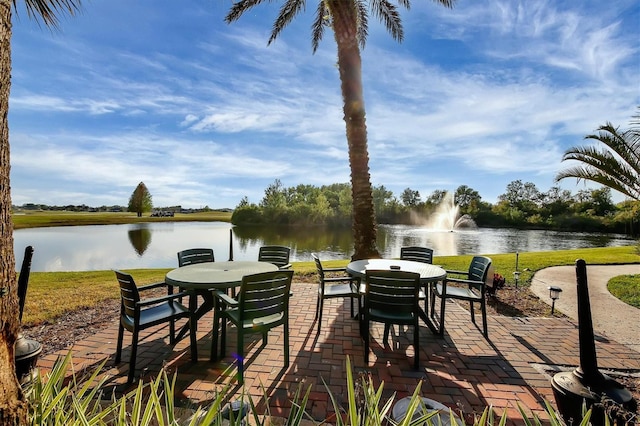 view of patio with a water view