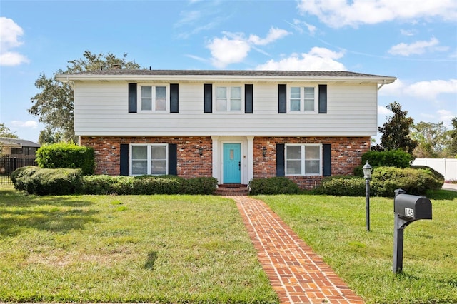 view of front of home featuring a front lawn