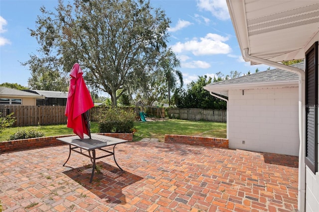 view of patio with a playground