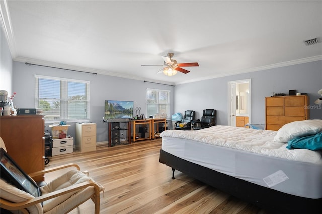 bedroom with ceiling fan, ornamental molding, and light hardwood / wood-style floors