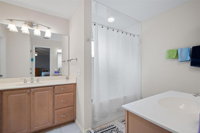 bathroom with vanity, shower / tub combo, and tile patterned flooring