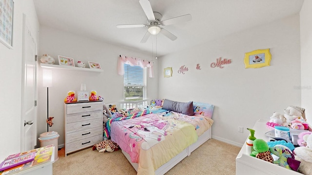 carpeted bedroom featuring ceiling fan