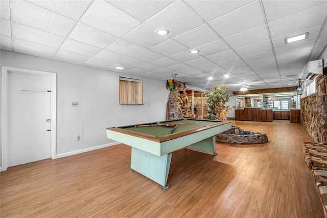 playroom featuring wood-type flooring, pool table, and a paneled ceiling