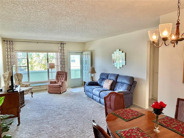 carpeted living room featuring a textured ceiling and an inviting chandelier