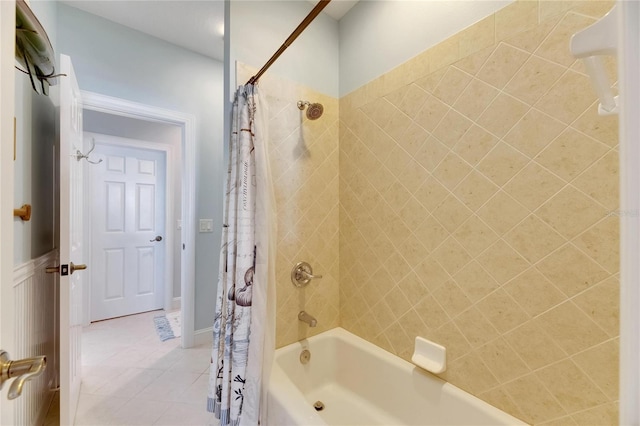 bathroom featuring tile patterned floors and shower / bath combination with curtain