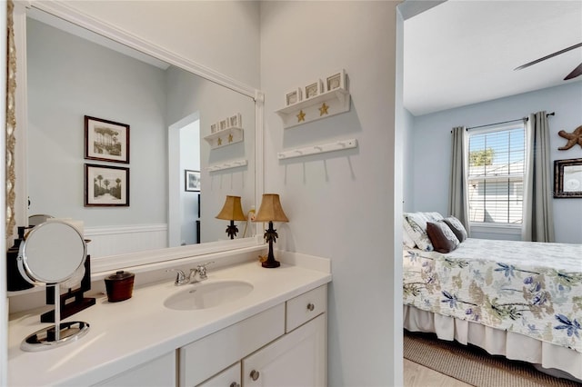 bathroom with vanity and ceiling fan