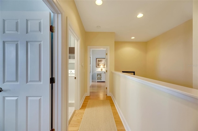 corridor featuring light hardwood / wood-style flooring