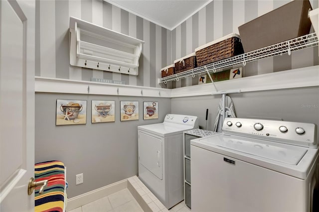 washroom with light tile patterned flooring and separate washer and dryer