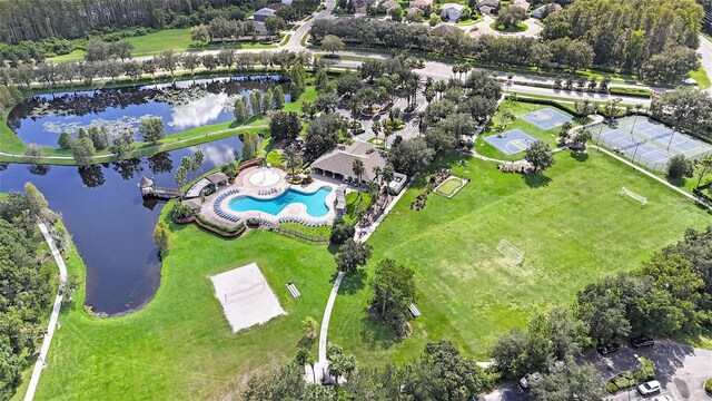 birds eye view of property featuring a water view