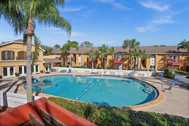 view of swimming pool featuring a patio