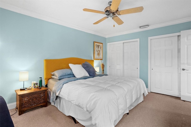 bedroom with ceiling fan, light colored carpet, and ornamental molding