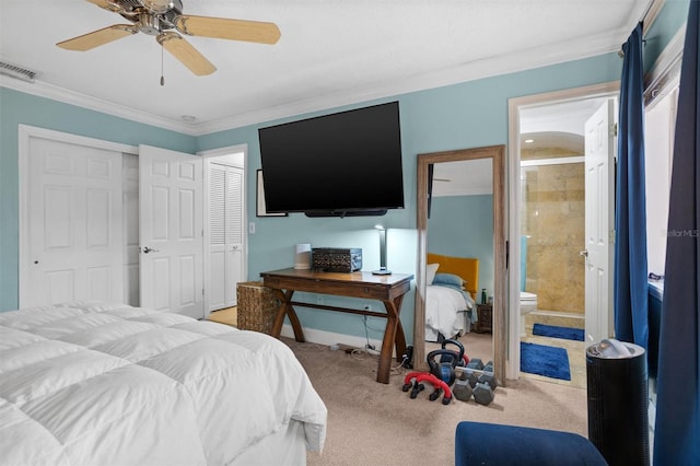 carpeted bedroom with crown molding, ceiling fan, and ensuite bathroom