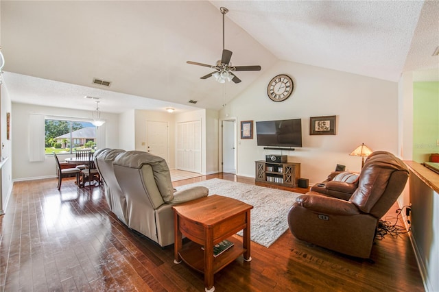 living room featuring dark wood-type flooring, ceiling fan, high vaulted ceiling, and a textured ceiling