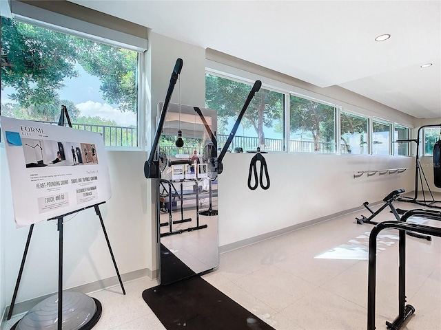 920 N Osceola Ave Unit 703, Clearwater, FL 33755 - workout room featuring baseboards and recessed lighting