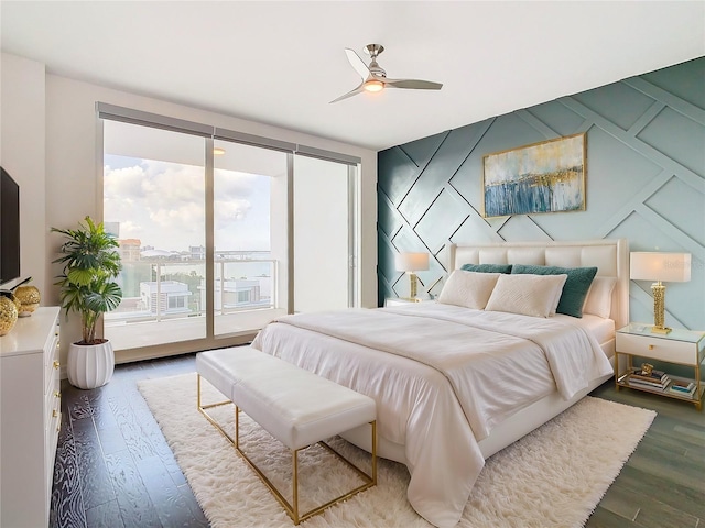 bedroom featuring ceiling fan, access to exterior, and wood-type flooring