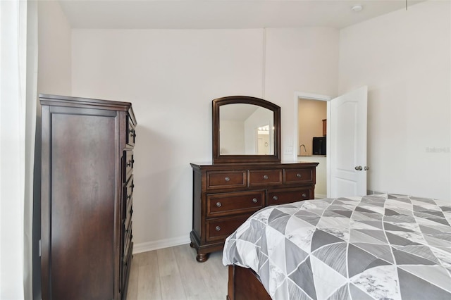 bedroom with light hardwood / wood-style flooring