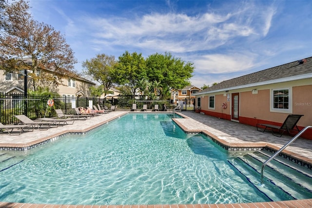 view of pool featuring a patio