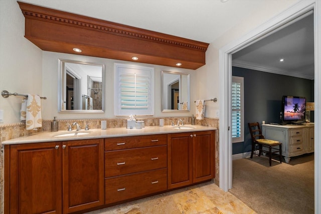 bathroom with vanity and crown molding