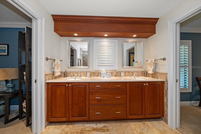 bathroom featuring vanity and crown molding