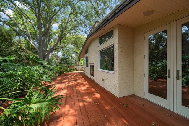 wooden terrace featuring french doors