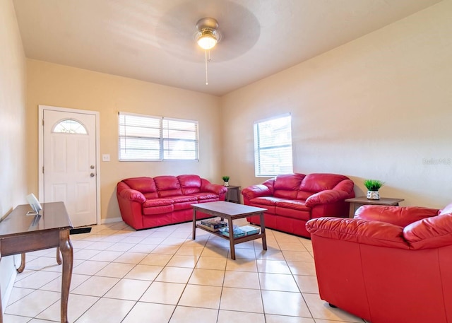 tiled living room with ceiling fan