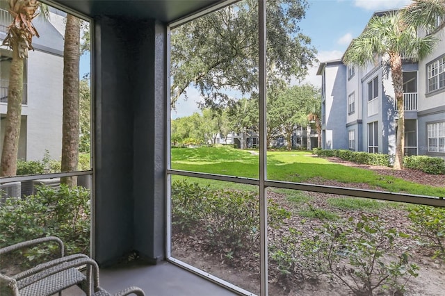 unfurnished sunroom featuring plenty of natural light