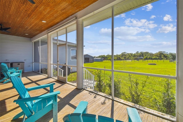 sunroom featuring wooden ceiling