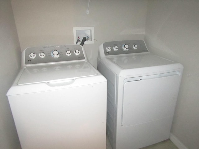 laundry room featuring independent washer and dryer