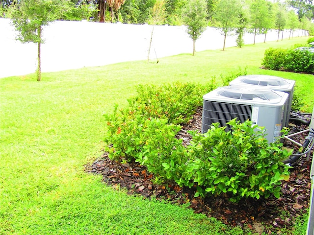 view of yard featuring central AC unit