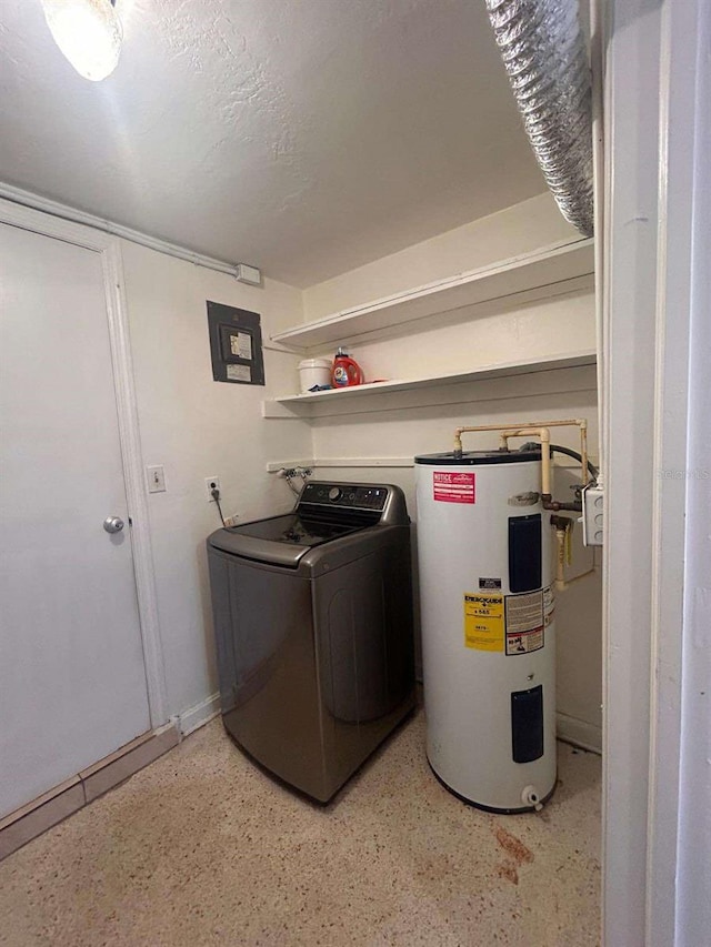 laundry room featuring water heater and washer / clothes dryer