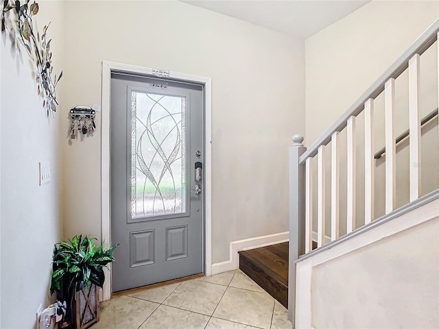 entrance foyer featuring light tile patterned floors