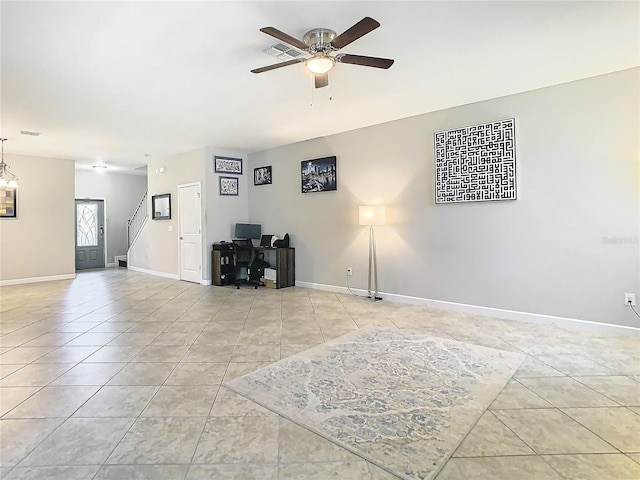 living area featuring ceiling fan, baseboards, visible vents, and tile patterned floors