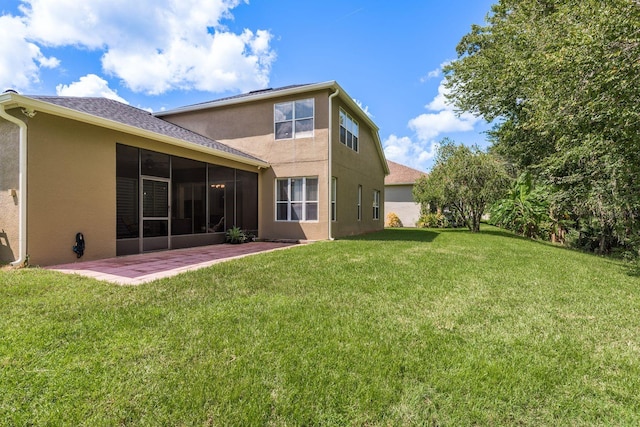 view of yard with a patio and a sunroom