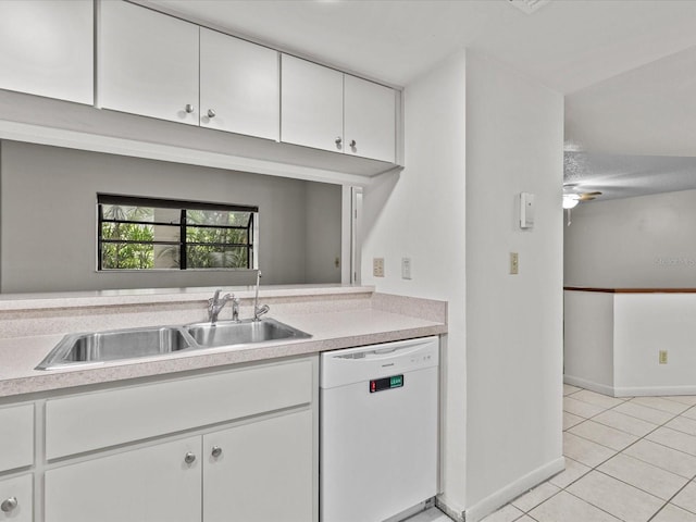 kitchen featuring light tile patterned flooring, white cabinetry, dishwasher, ceiling fan, and sink