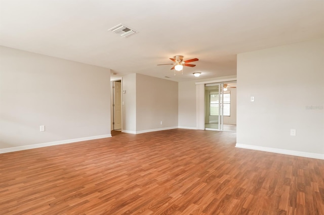 empty room featuring light hardwood / wood-style flooring and ceiling fan