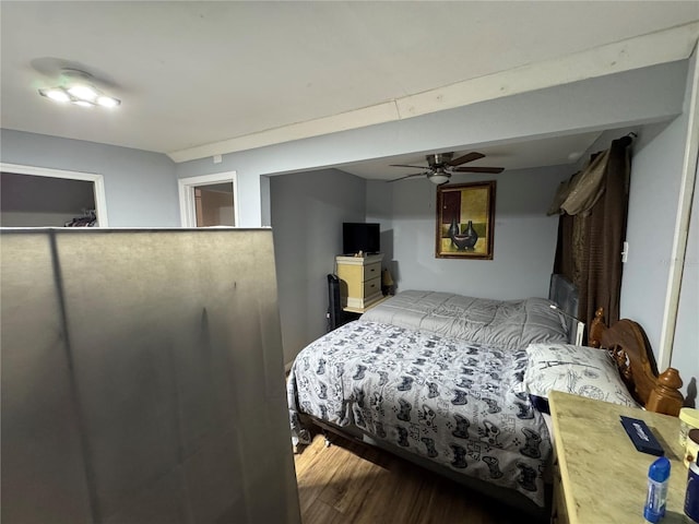 bedroom with hardwood / wood-style floors and ceiling fan