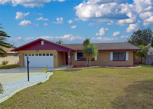 ranch-style house featuring a garage and a front lawn