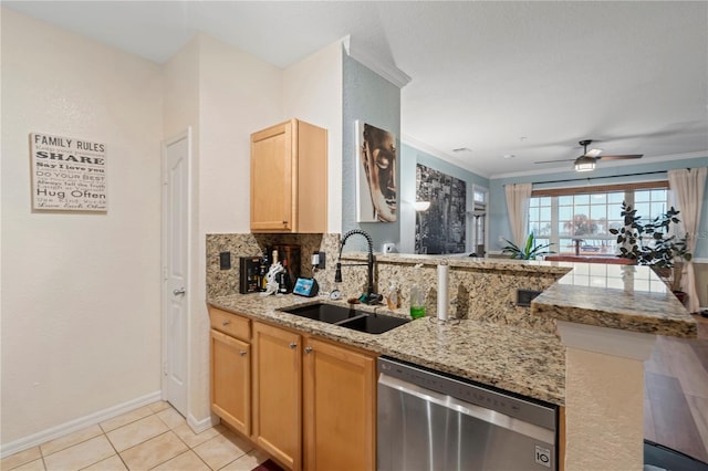 kitchen featuring light tile patterned flooring, crown molding, light brown cabinetry, stainless steel dishwasher, and sink