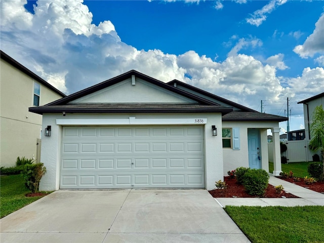 single story home featuring a garage