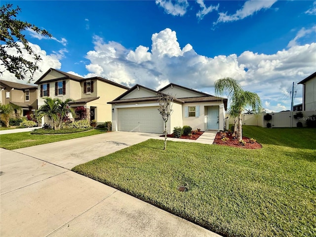 view of front of property featuring a garage and a front lawn