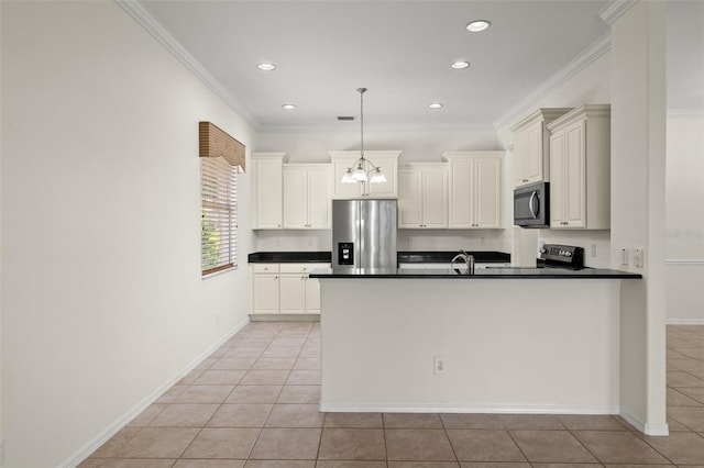 kitchen with ornamental molding, pendant lighting, light tile patterned floors, and stainless steel appliances