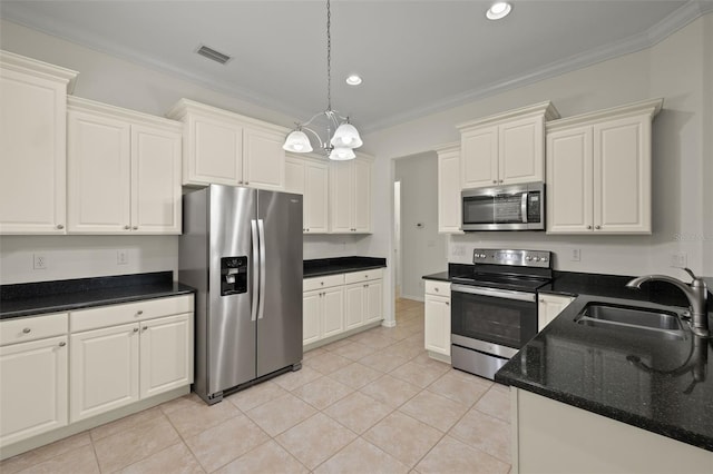 kitchen with light tile patterned floors, sink, ornamental molding, a chandelier, and stainless steel appliances