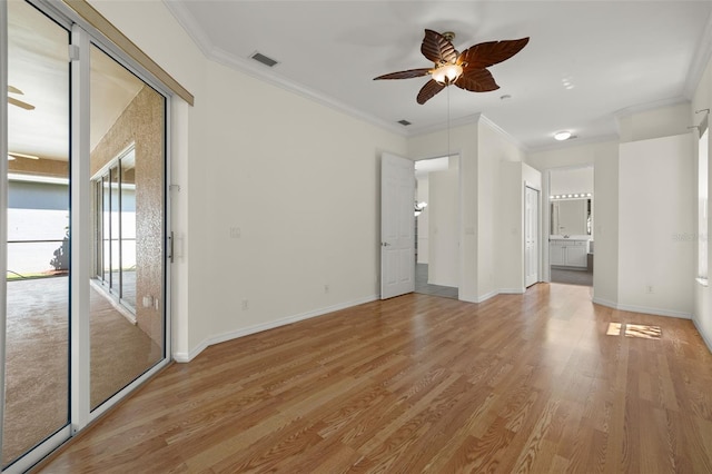 unfurnished room with light hardwood / wood-style floors, crown molding, and ceiling fan