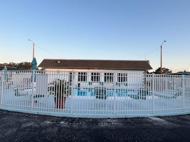 exterior space featuring a patio area and a community pool