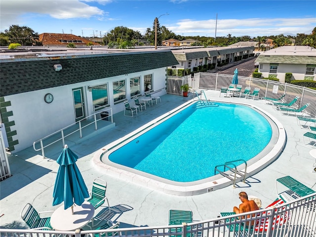 view of swimming pool featuring a patio