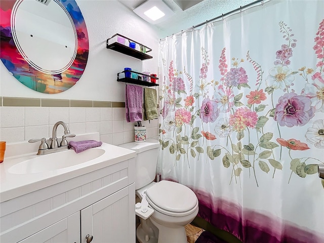 full bathroom with vanity, decorative backsplash, toilet, shower / bathtub combination with curtain, and tile walls