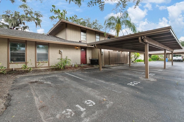 view of car parking featuring a carport