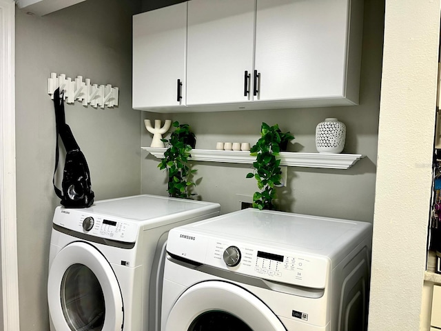 washroom with separate washer and dryer