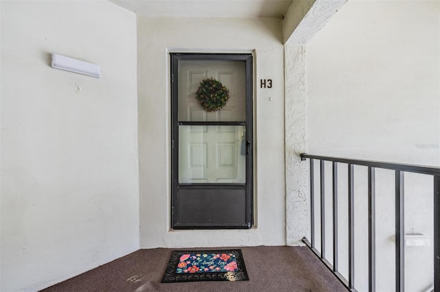 doorway to property with a balcony